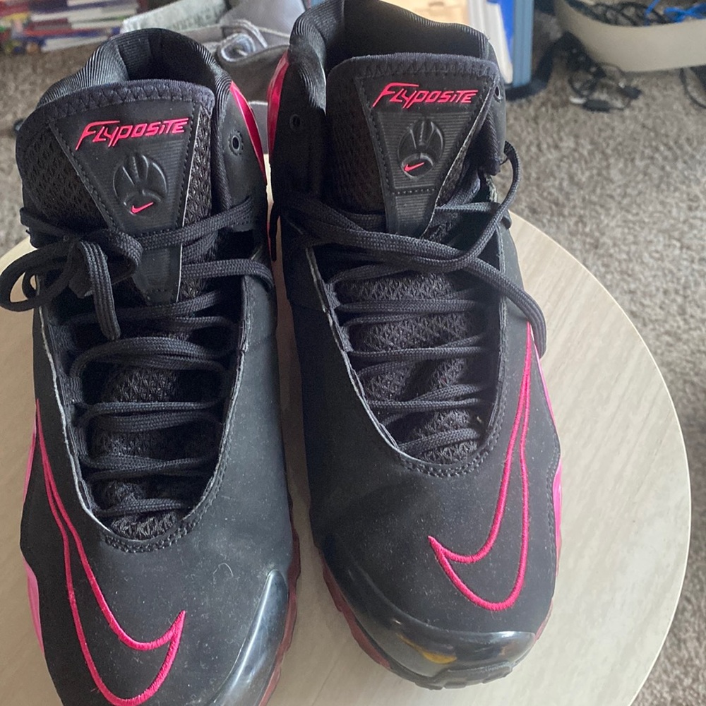 Nike Flyposite hot pink and black basketball shoe… very stylish… great look…